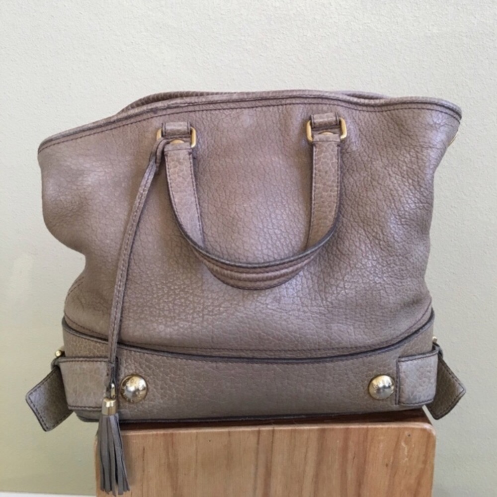 Dolce and Gabbana tan bag with tassel detail